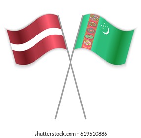 Latvian and Turkmen crossed flags. Latvia combined with Turkmenistan isolated on white. Language learning, international business or travel concept.