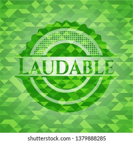 Laudable green emblem with triangle mosaic background