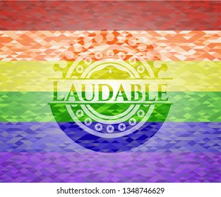 Laudable on mosaic background with the colors of the LGBT flag