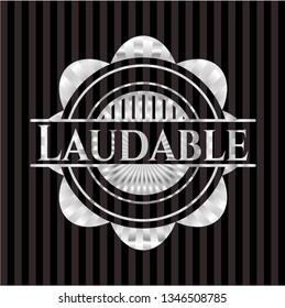 Laudable silvery emblem or badge