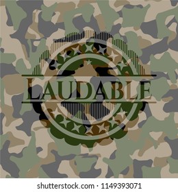 Laudable written on a camo texture