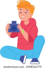 Laughing boy with photo camera shooting pictures isolated on white background