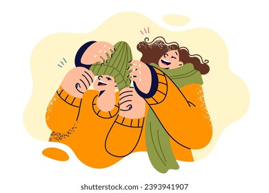 Laughing children don winter hats and scarves as head out for sunday walk or trip to ski resort. Happy brother and sister spend time together enjoying communication and preparing for winter holidays