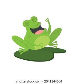 A laughing frog sitting on a leaf