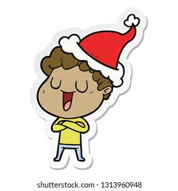 laughing hand drawn sticker cartoon of a man wearing santa hat