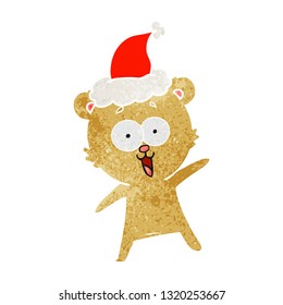 caricatura retro de osito de peluche riéndose de un sombrero santa