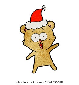 laughing teddy  bear hand drawn textured cartoon of a wearing santa hat