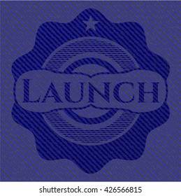Launch badge with denim texture