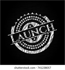 Launch chalk emblem written on a blackboard