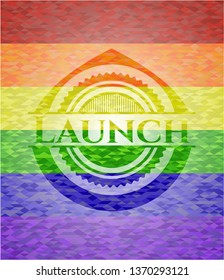 Launch emblem on mosaic background with the colors of the LGBT flag