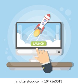 Launching new business. Hand pushing button on computer screen with rocket.