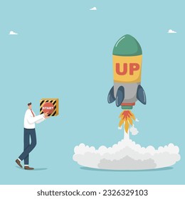 Launching a startup or a new business project or product, introducing innovations for additional profit, implementing creative ideas to achieve success, man launches a rocket with the start button.