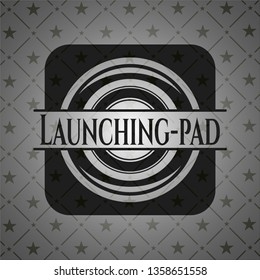 Launching-pad dark badge