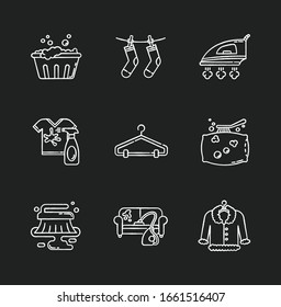 Laundry and cleanup service chalk white icons set on black background. Handwash, stain removal, outdoor drying, ironing. Furniture and pillow dry cleaning. Isolated vector chalkboard illustrations