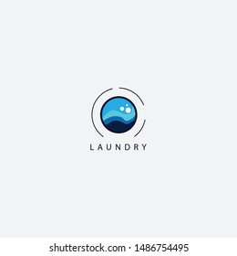 Laundry Logo With A Variety Of Blue Water Shapes And Soap Foam Balls Make This Design. Unique, Elegant, Modern, Luxurious.
 
