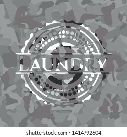 Laundry on grey camo texture