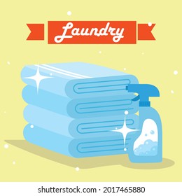 Laundry towels with detergent spray on yellow background
