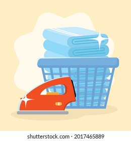Laundry towels inside basket with iron on yellow background