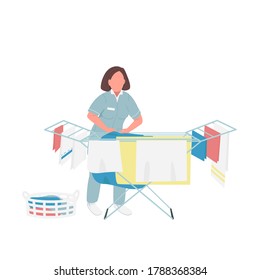 Laundry worker flat color vector faceless character. Housekeeper drying sheets isolated cartoon illustration for web graphic design and animation. Clothes cleaning business, janitorial service