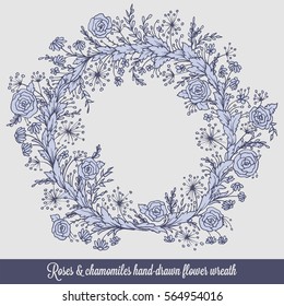 Laurel wreath frame with roses, chamomiles and flourishes. Decorative vintage element in engraving style, hand-drawn floral doodle decor for cards or design