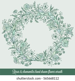 Laurel wreath frame with roses, chamomiles and flourishes. Decorative vintage element in engraving style, hand-drawn floral doodle decor for cards or design