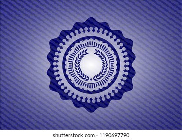 laurel wreath icon inside badge with denim texture