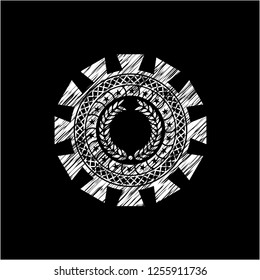 laurel wreath icon inside chalk emblem written on a blackboard