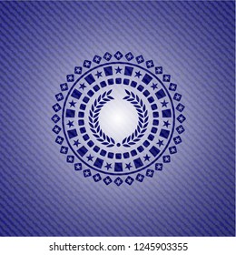 laurel wreath icon inside emblem with jean background