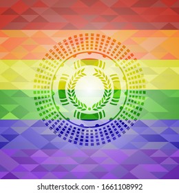 icono de laurel en el interior del emblema sobre fondo de mosaico con los colores de la bandera LGBT