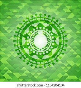 laurel wreath icon inside green emblem with mosaic ecological style background