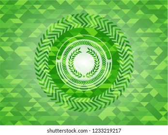 laurel wreath icon inside green emblem with mosaic background