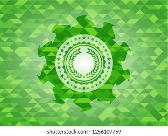 laurel wreath icon inside green mosaic emblem
