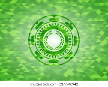 laurel wreath icon inside green emblem. Mosaic background