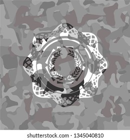 laurel wreath icon inside grey camouflage texture