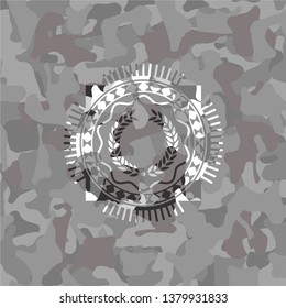 laurel wreath icon inside grey camouflage texture