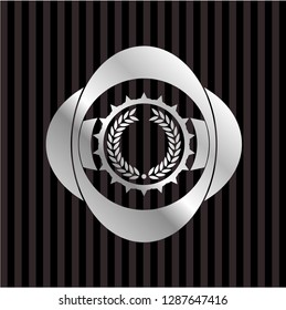 laurel wreath icon inside silver emblem or badge