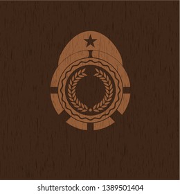 laurel wreath icon inside wood badge or emblem