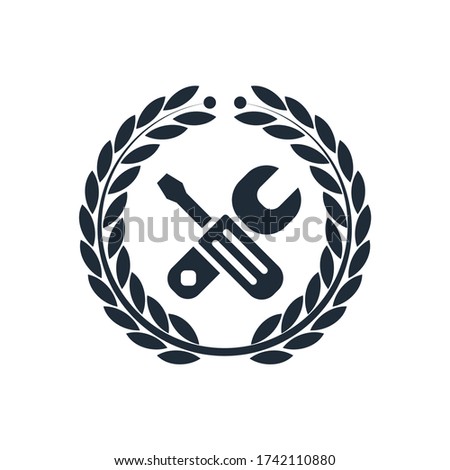 Laurel wreath and tools. Master. Highly qualified specialist. Vector icon isolated on white background.