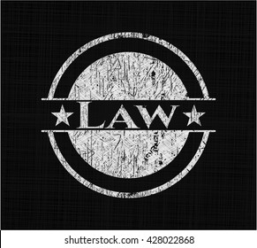 Law chalkboard emblem on black board
