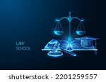 Law school, education concept with open book, gavel, scales and graduation cap on dark blue