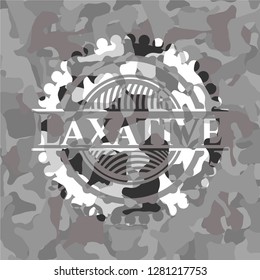 Laxative on grey camo texture