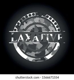 Laxative on grey camo texture