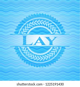 Lay light blue water wave badge background.