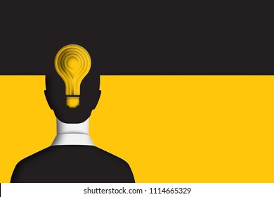 Layered cut out colored paper human back view and light bulb. Businessman in business suit. Inspiration, creativity and idea concept. Deep paper art style