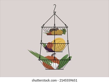 A layered hanging vase with fruits and vegetables, farmers market food