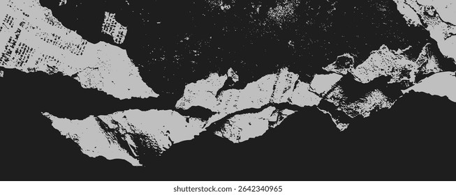Layers of torn paper create a striking abstract composition, featuring contrasting black and white tones.
