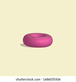 laying pink donut with icing on the top 