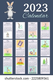 layout of a vertical calendar for 2023 with a rabbit in blue with a character and pictures for each month