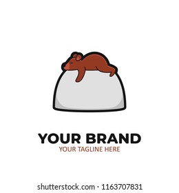 Lazy bear logo icon. Bear sleeping on a stone illustration