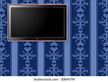 LCD television over bluish vintage pattern wallpaper
